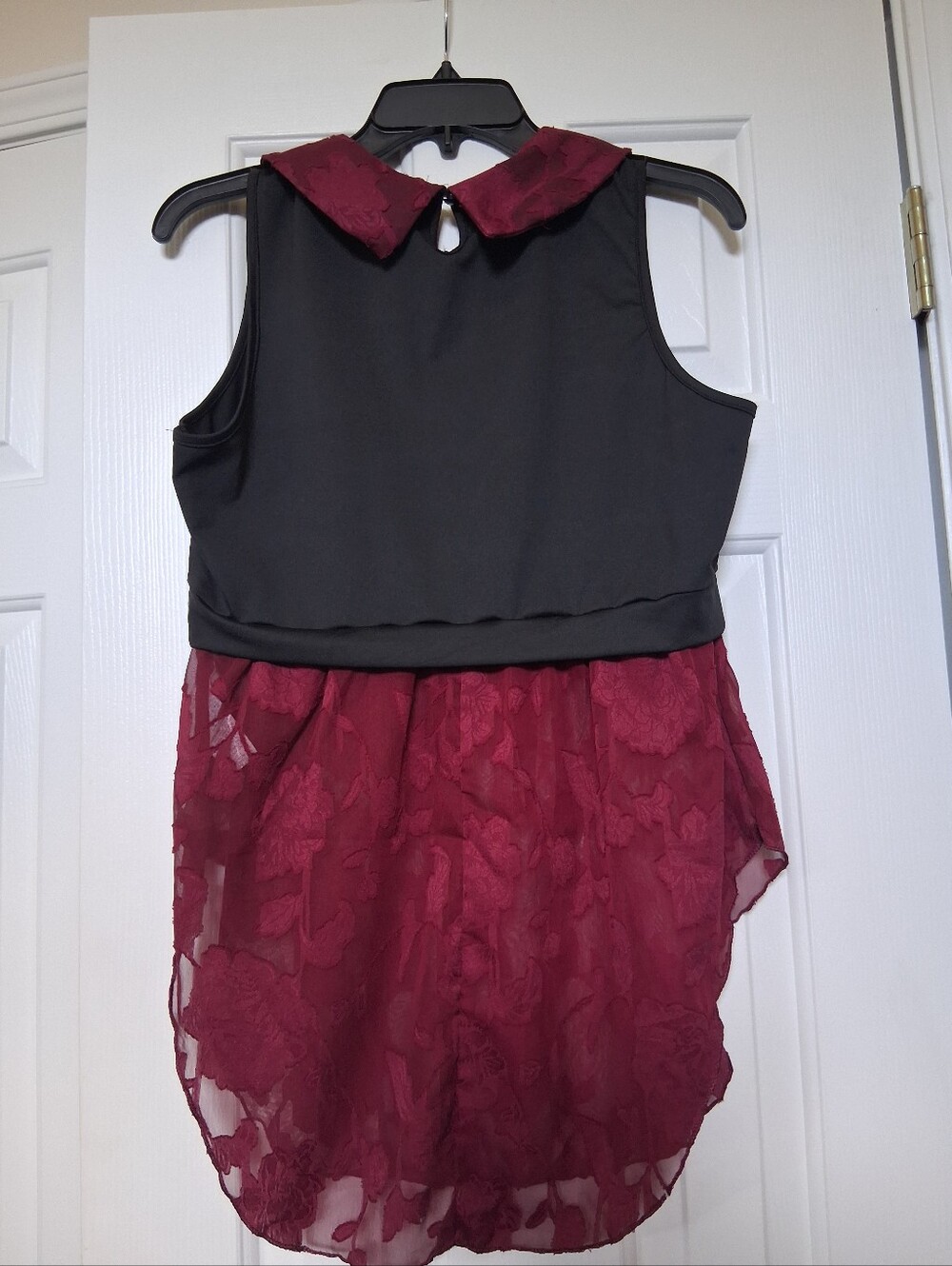 Sleeveless Black Top with Burgundy Lace High-Low Hem